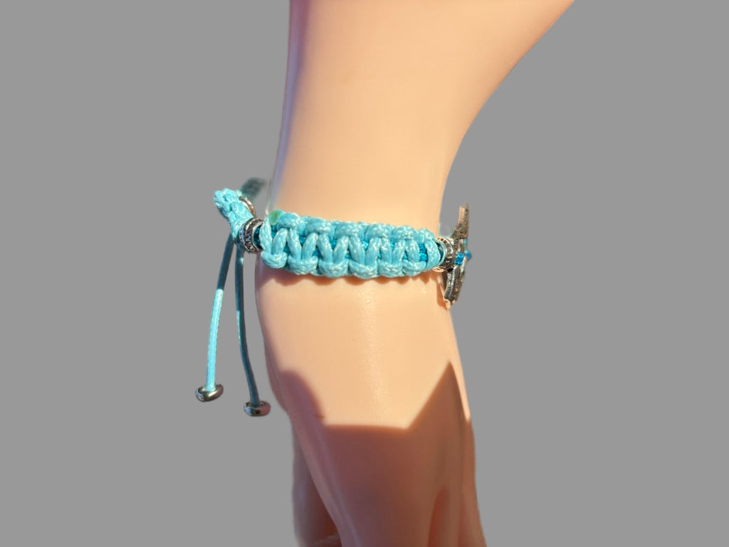 Braided Bracelet With Leather Cord Displaying A Metal Flower