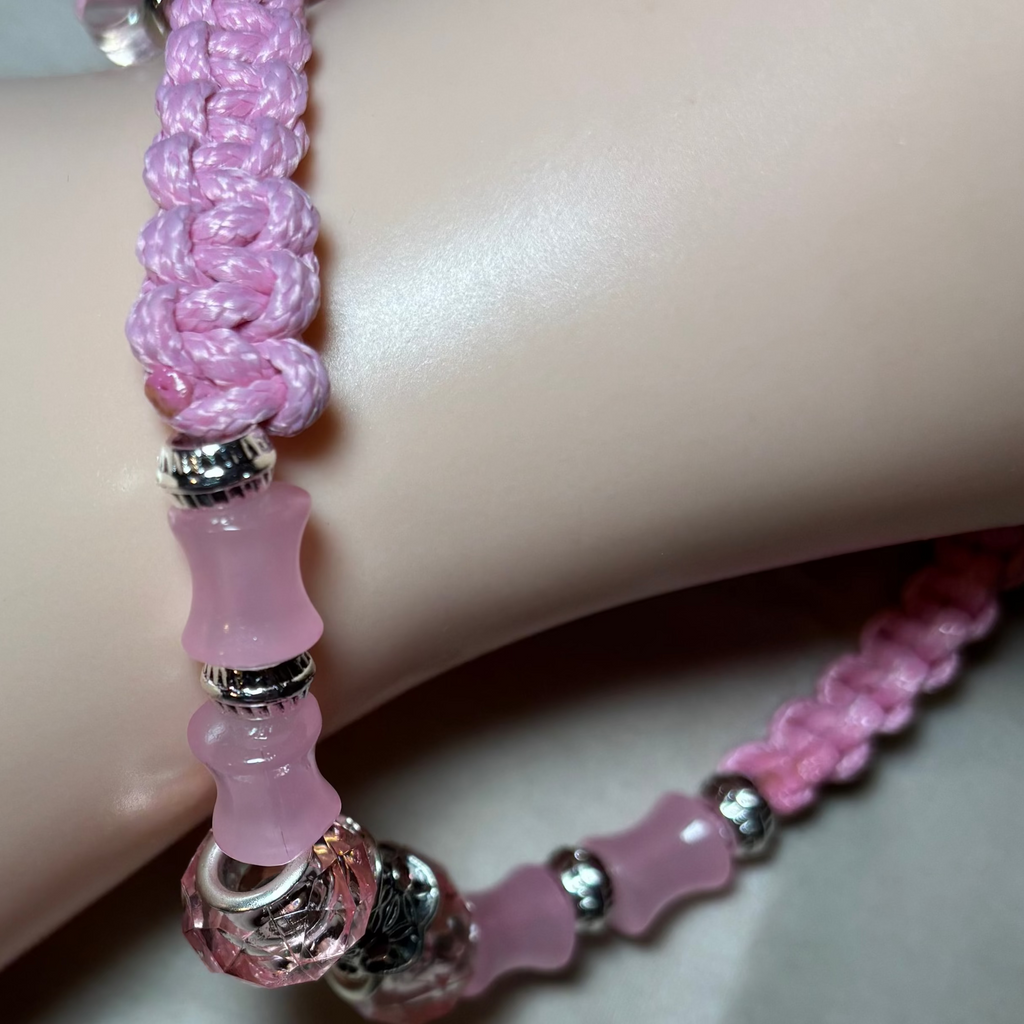 Pink beaded bracelet with silver accents 