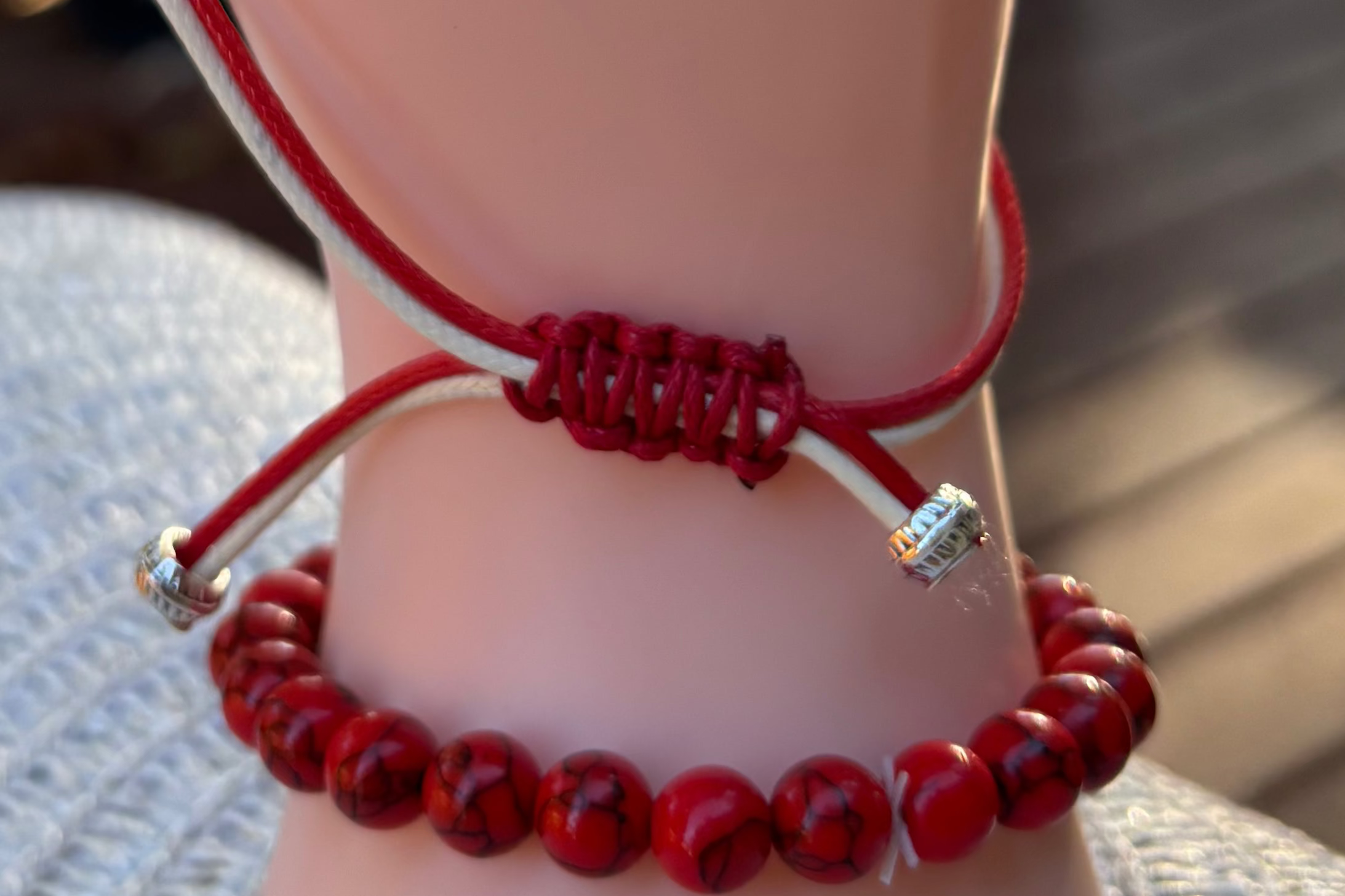 Breaded Bracelet Set In Red And Beige With A Charm