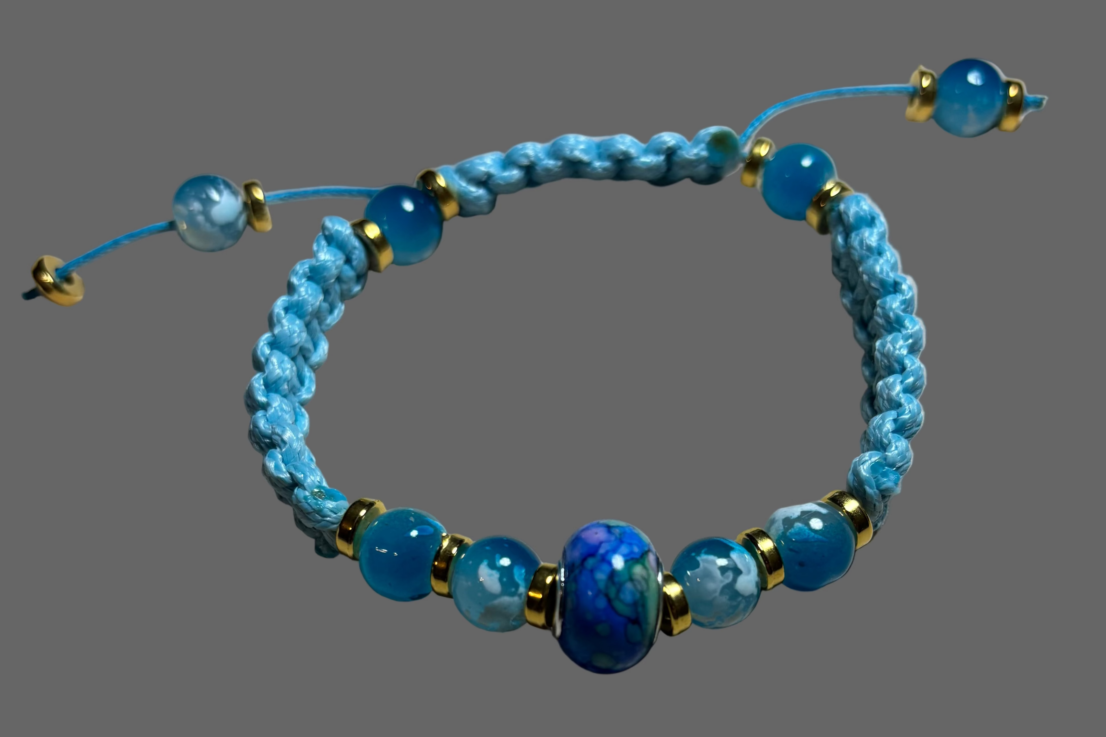 Blue beaded bracelet with gold 