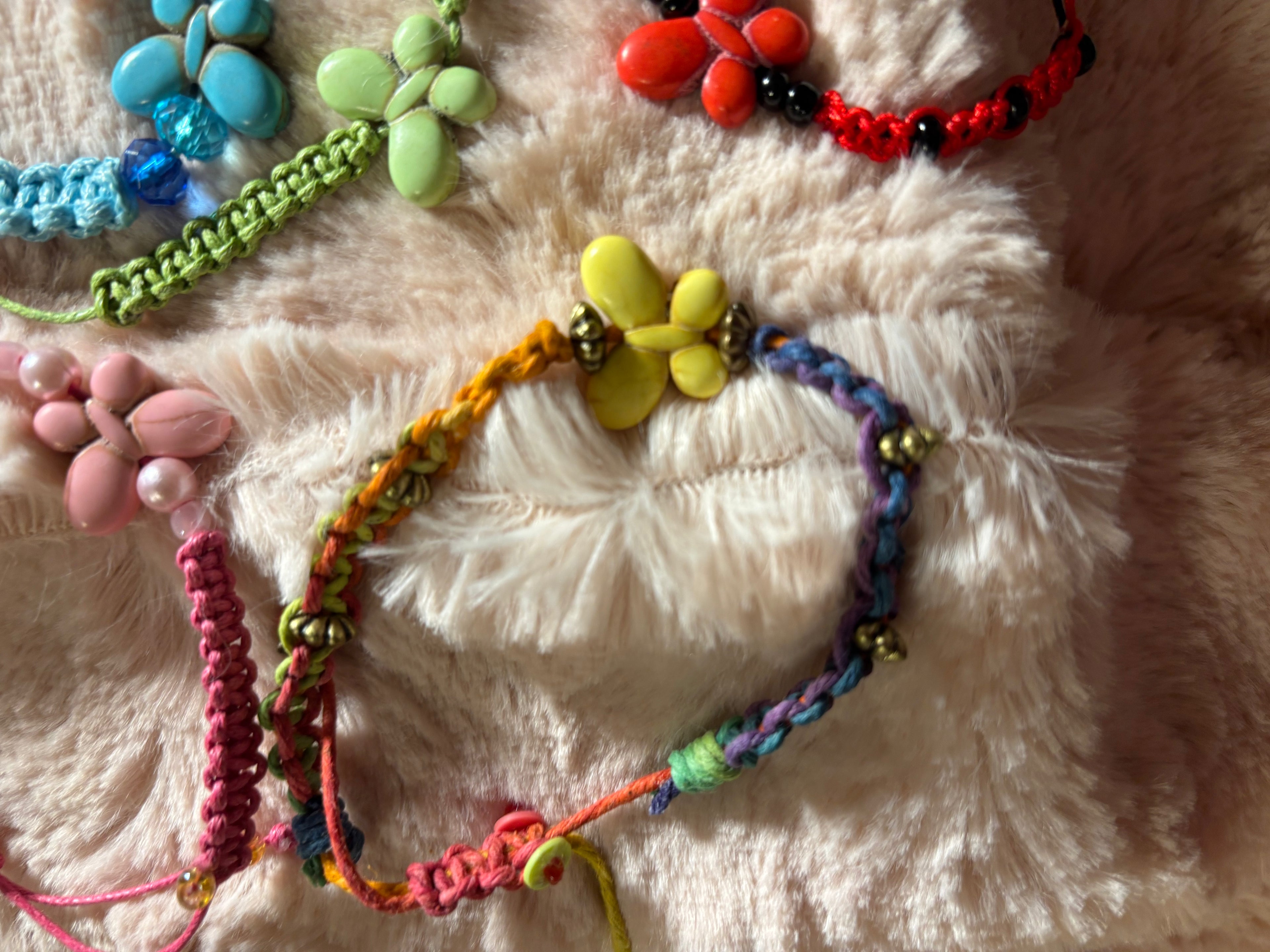 Colorful Braided bracelet with a ceramic butterfly