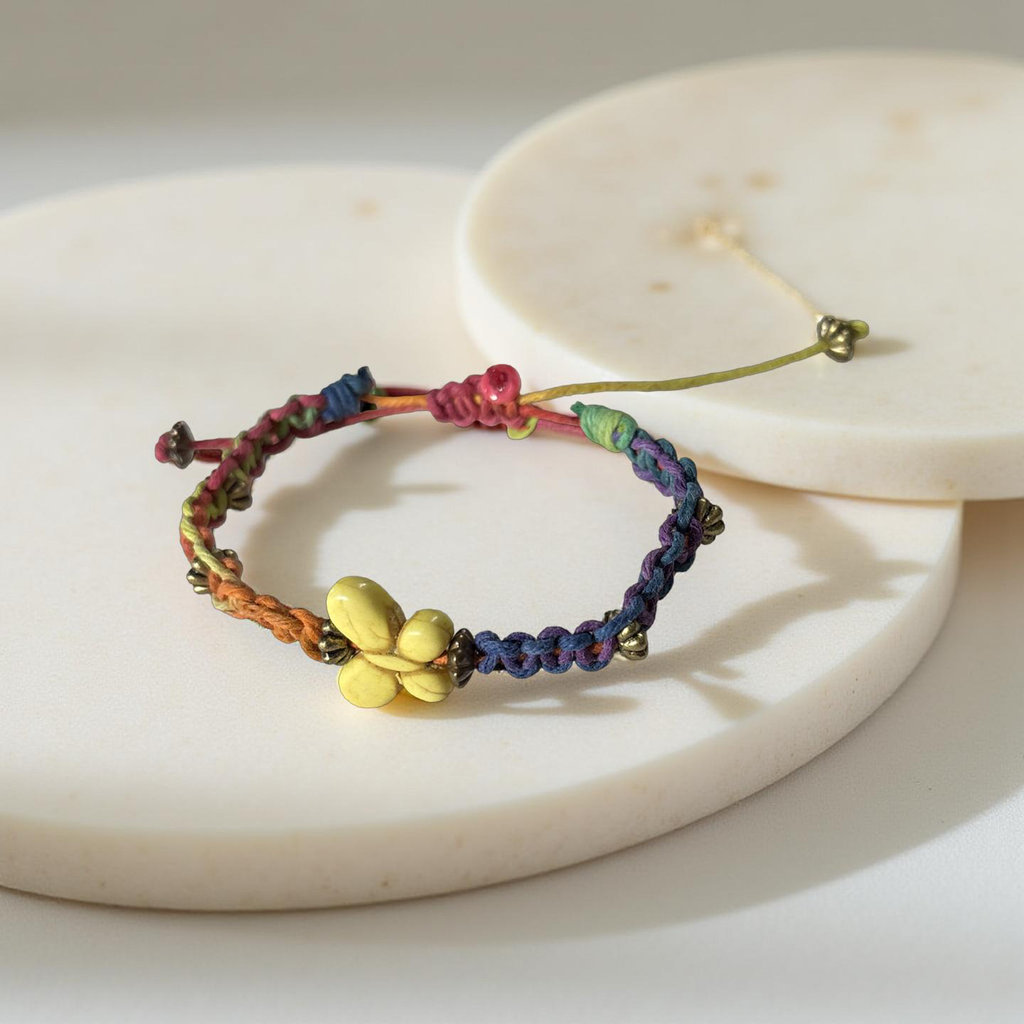 Colorful Braided bracelet with a ceramic butterfly