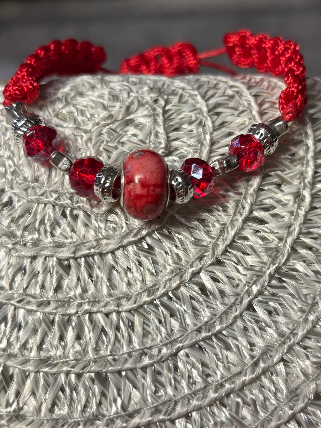Breaded Bracelet With Nylon Thread And Beads In Red And Silver Colors