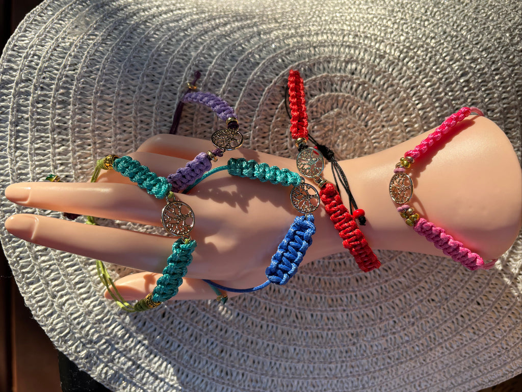 Braided Bracelet Featuring A Beautifully Detailed Tree Of Life Connector