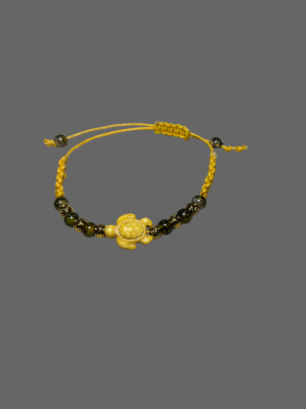 Beaded bracelet with yellow and green beads 