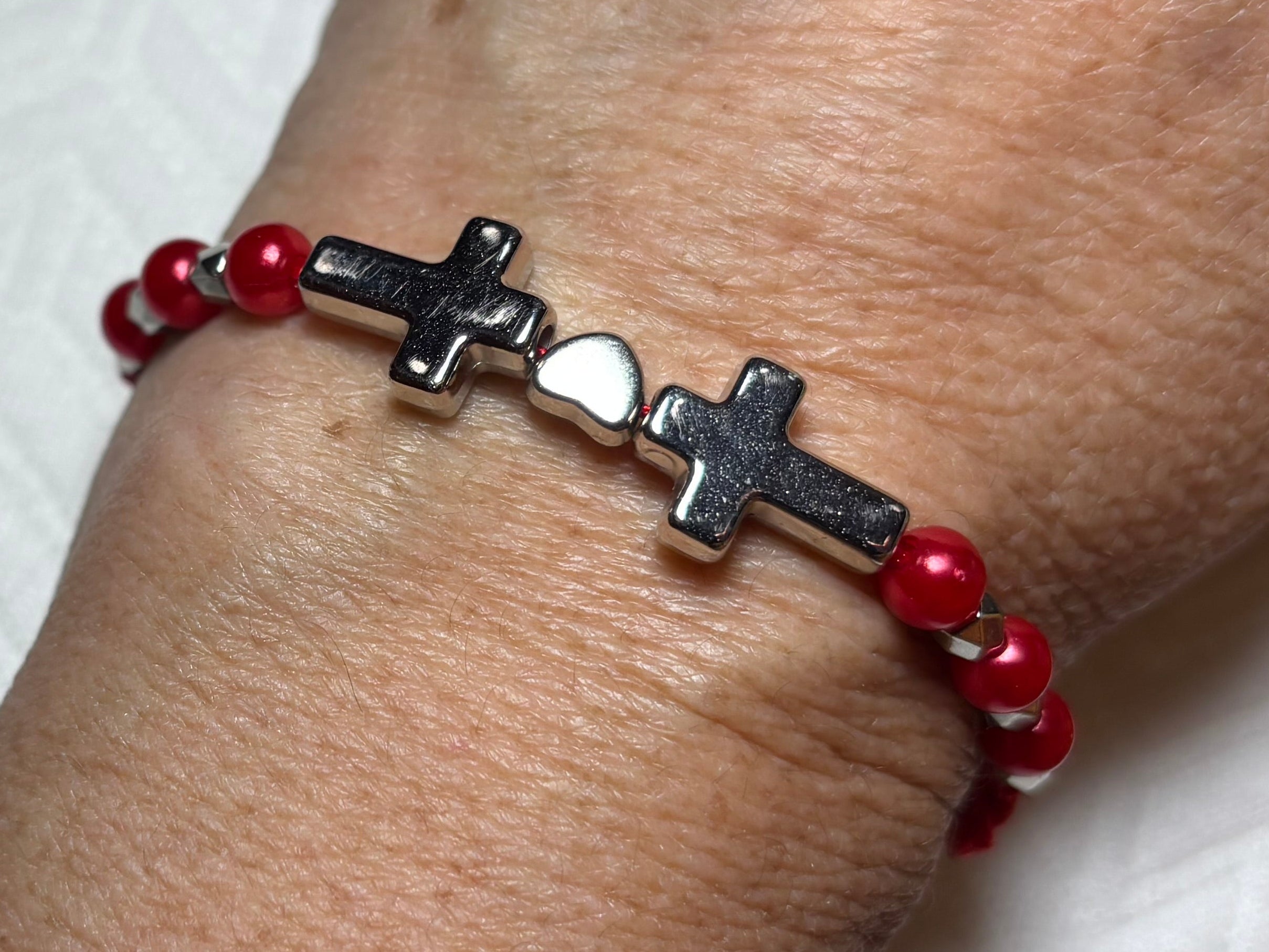 Braided design bracelets with two crosses